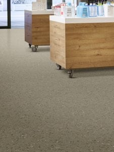 Dynamic Chips - kleur 843 - Detail naadloze slijtvaste PVC-vloer drogist